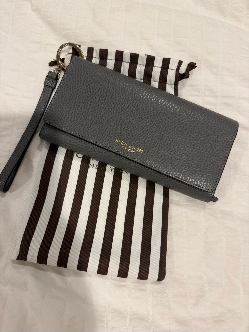 henri bendel Pebbled Leather Gray Wristlet Clutch with Gold Logo